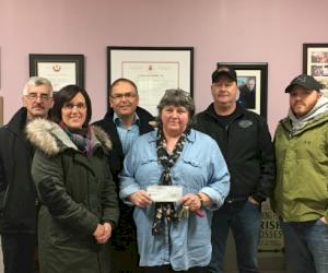 Photo L-R Ken Matthews, Natalie Raymond, Rick Benoit, Evelyn McNlty (Romero House), Dickie McGuire and Chris Arsenault