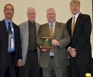 (Pictured from L-R:  Greg Runnoe-SMET Construction, Steve Hansen, Dave Pelson and Dennis Kennedy of Solberg)